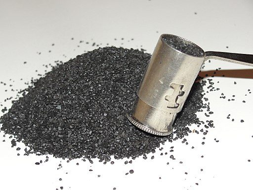 Black powder with scoop.
